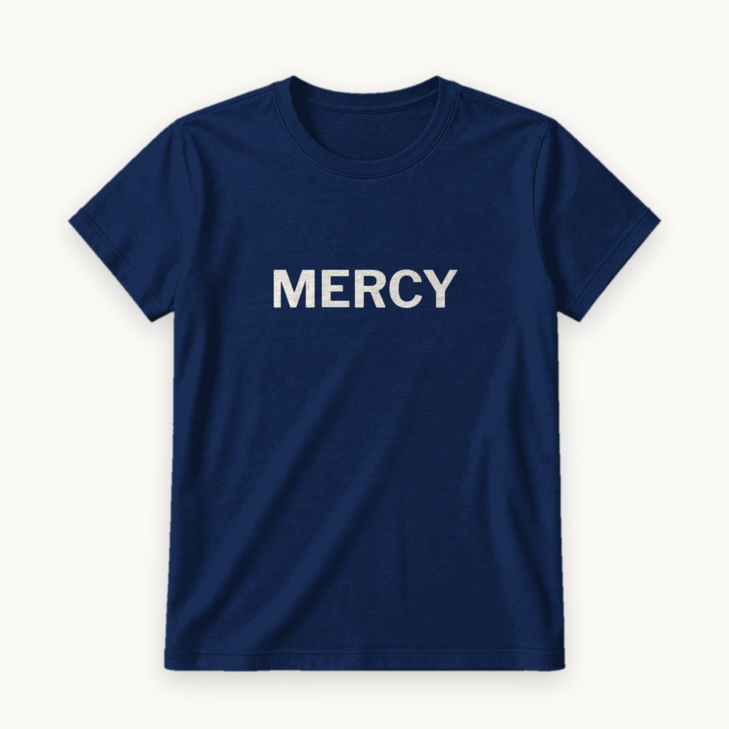 Mercy printed on a Navy tee — product photography