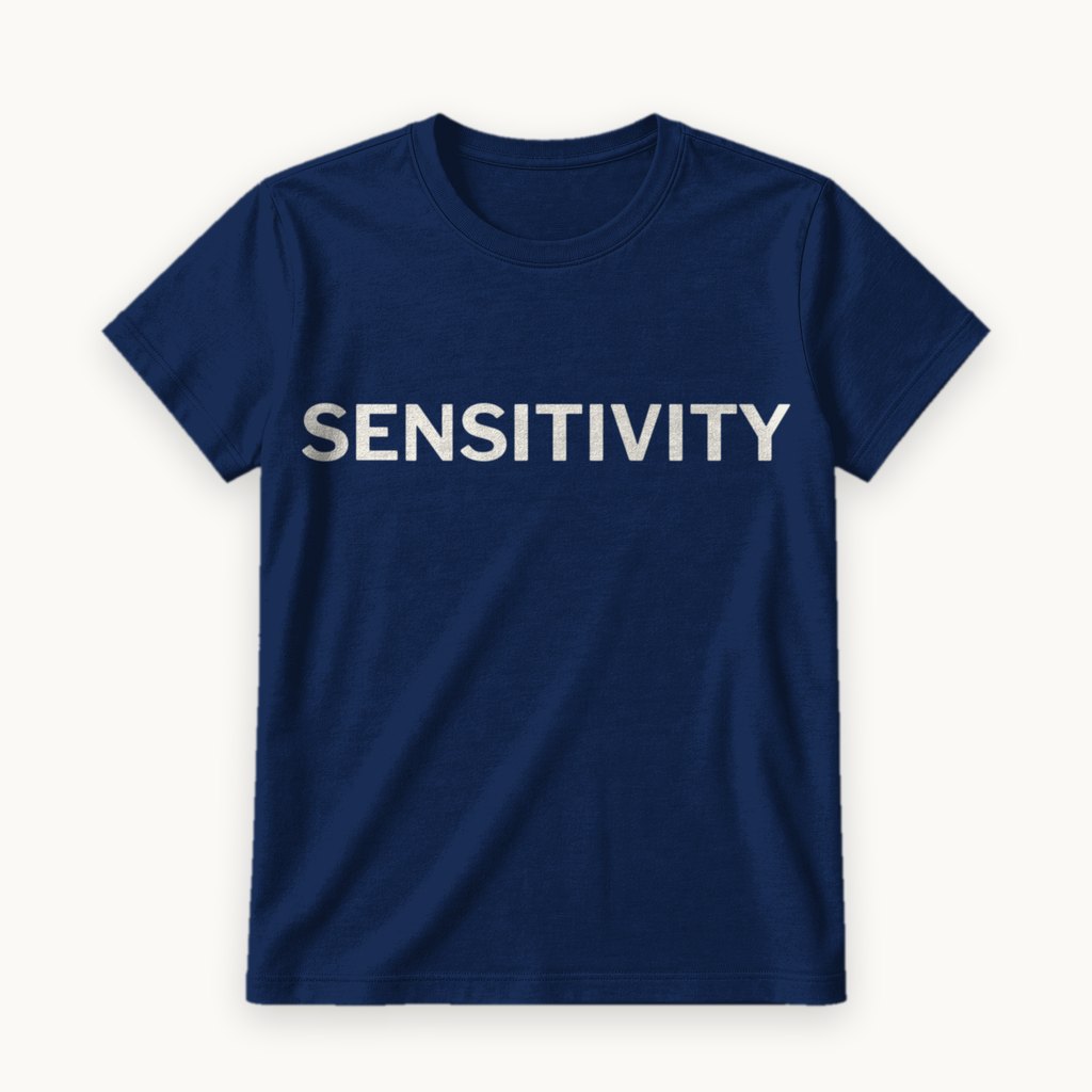 Sensitivity printed on a Navy tee — product photography