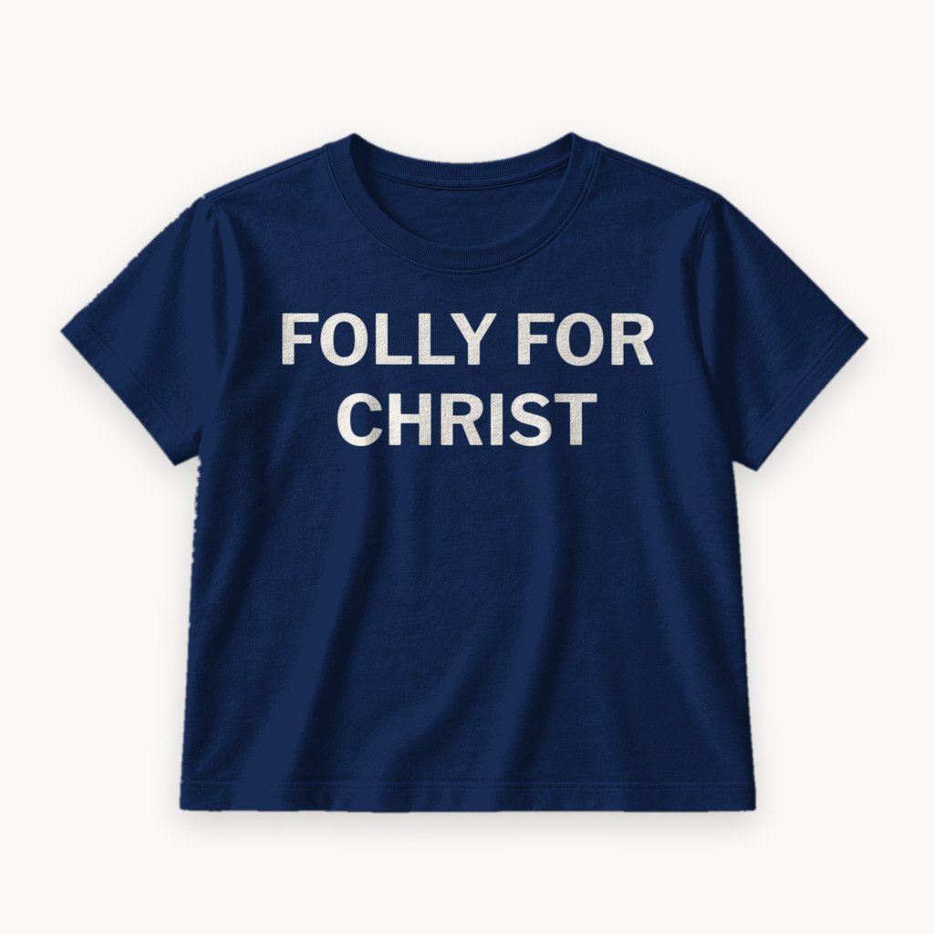 Folly for Christ printed on a Navy tee — product photography